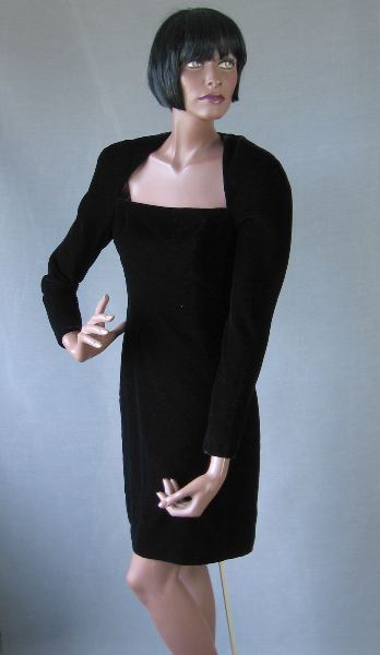 1980s black velvet cocktail dress with strong shoulders