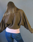 back view, cropped leather jacket with batwing sleeves 