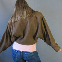 back view, cropped leather jacket with batwing sleeves 