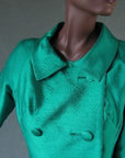 closer view, emerald green double breasted jacket with large collar