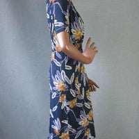 side view of 40s 50s feather print dress