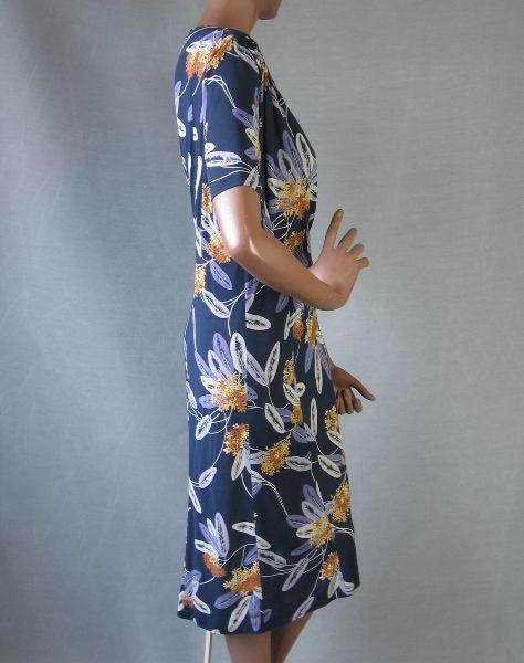 side view of 40s 50s feather print dress