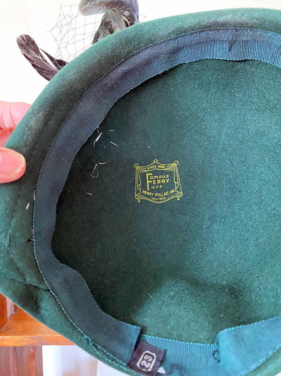 view of inside of dark green 40s 50s hat