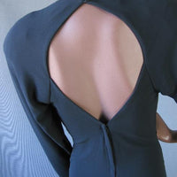 close up detail, large keyhole back of extreme 80s dress