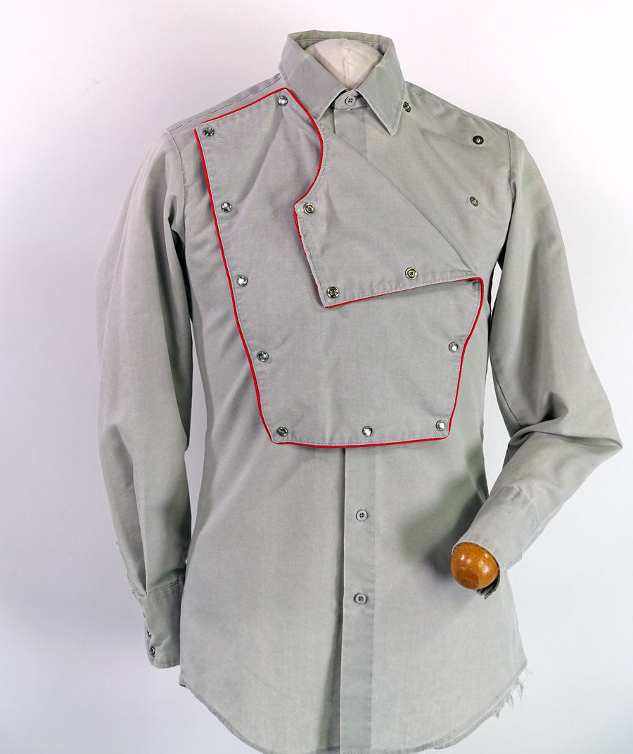 men's western shirt showing bib front part way removed