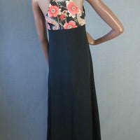 back view, racerback maxi dress black with Birtwell inspired poppy print