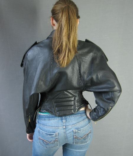back view, 80s high style motorcycle jacket by Michael Hoban with batwing sleeves