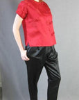 another view, red Chinese brocade top with black satin pants