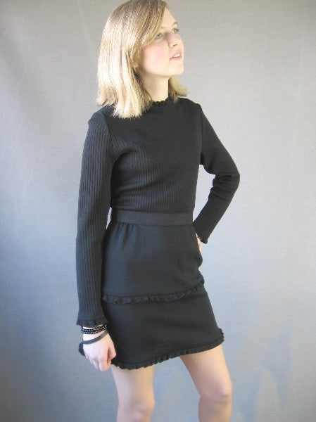 1970s ruffle edged black knit mini dress