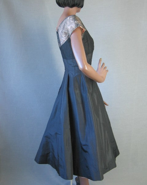 side view, fit and flare 50s designer cocktail dress