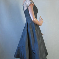 side view, fit and flare 50s designer cocktail dress