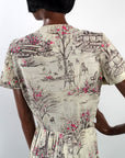 closer view, back bodice of novelty print dress depicting park bandshell, chairs and benches