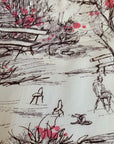 close up of novelty print, park bench, flowering bushes