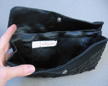 inside, black satin beaded clutch bag