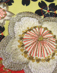 detail view, metallic embroidery applied to 1940s jacket fabric