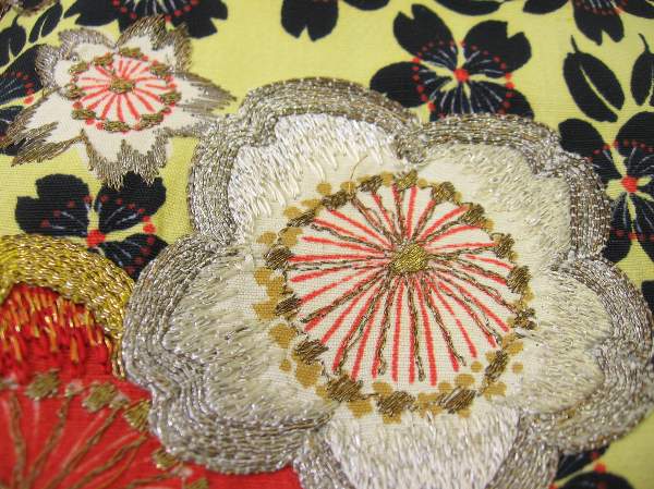 detail view, metallic embroidery applied to 1940s jacket fabric