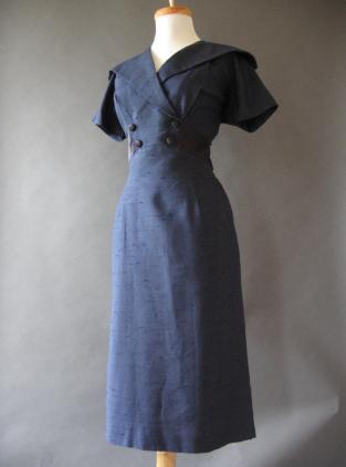 50s vintage fitted cocktail dress with double breasted bodice