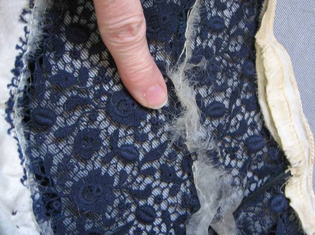 another view of deteriorated gossamer lining inside lace yoke