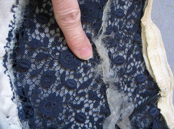 another view of deteriorated gossamer lining inside lace yoke