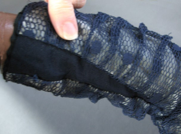 close up detail, alteration that enlarged the lower sleeve opening