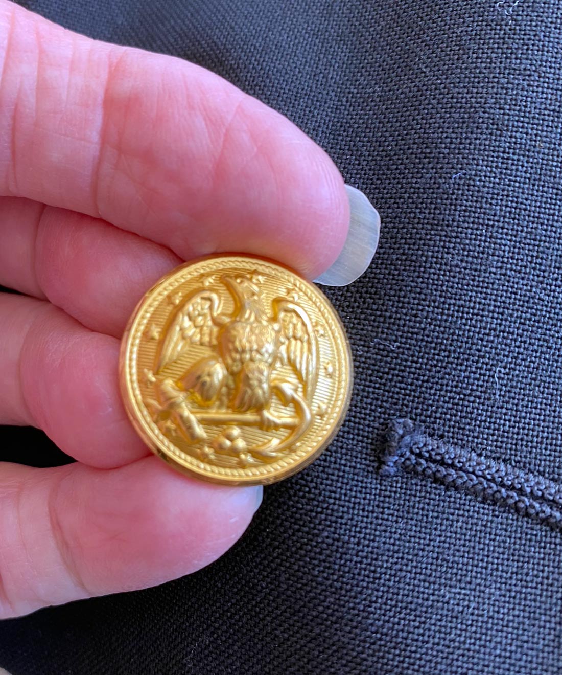 close up detail, buttons on US navy officer&#39;s jacket