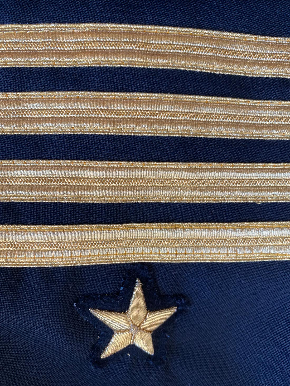 close up detail of stars and bars, USN officer's jacket