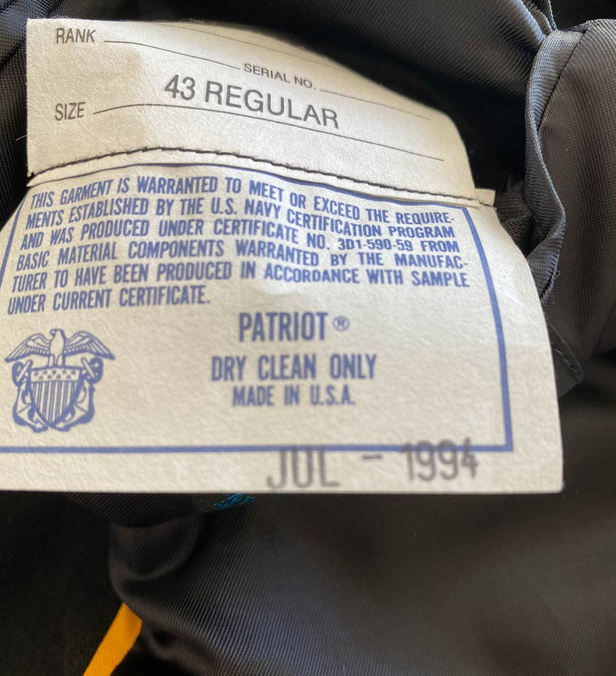 inner pocket label for 90s mess jacket with date and size
