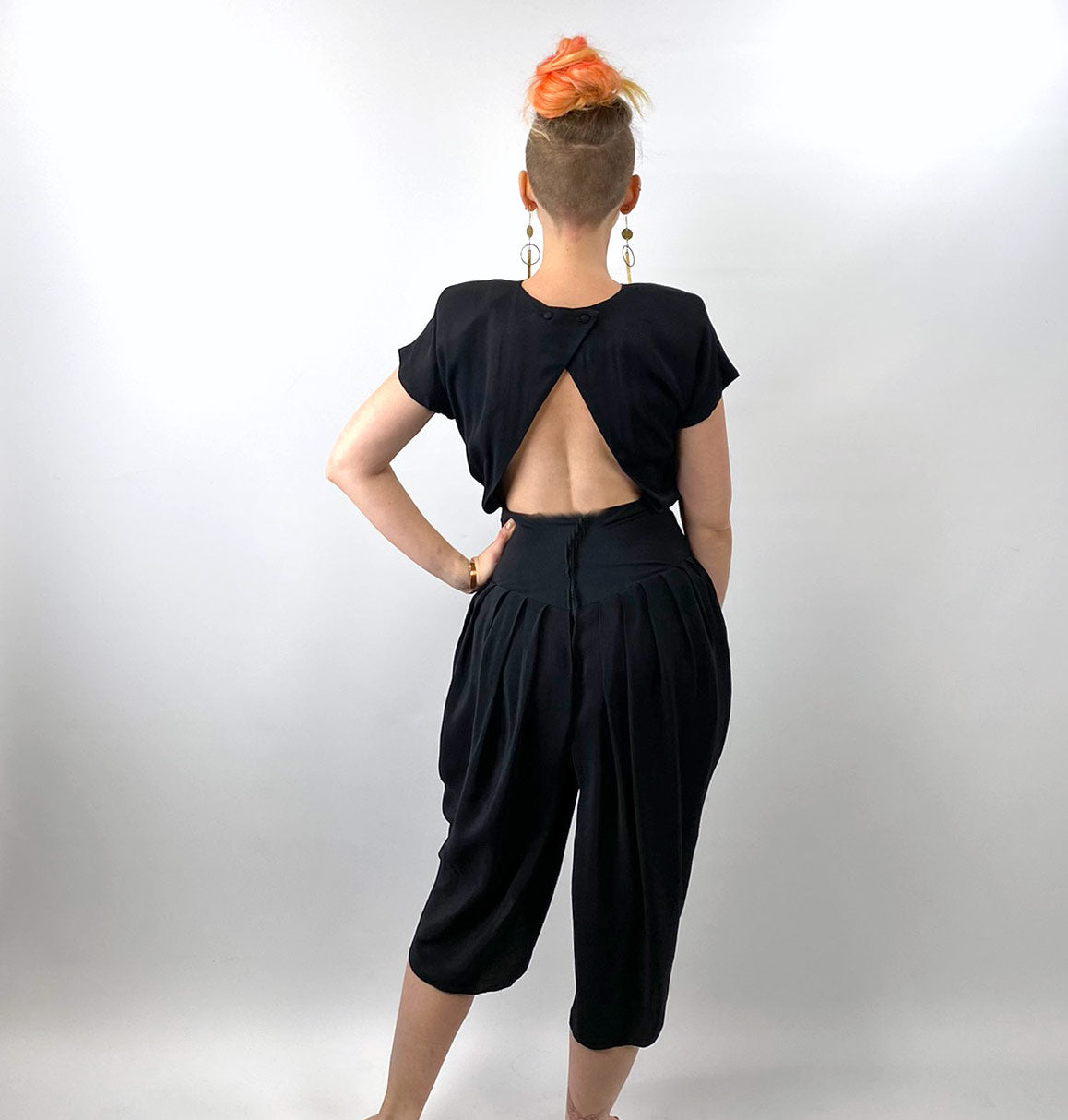 back view, 80s jumpsuit showing triangular keyhole bodice back