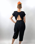 back view, 80s jumpsuit showing triangular keyhole bodice back