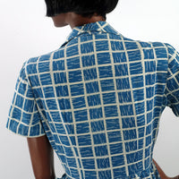 back view of bodice showing geometric brushstroke print in dark turquoise and white