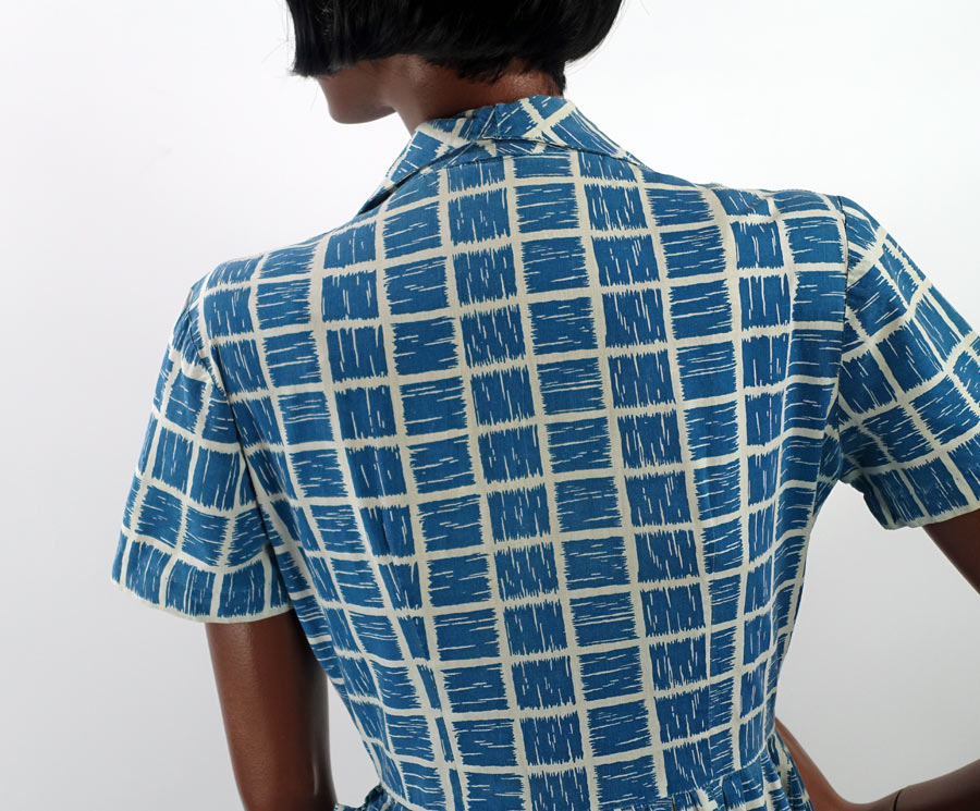 back view of bodice showing geometric brushstroke print in dark turquoise and white