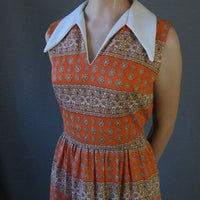 bodice, paisley striped maxidress with large pointy white collar