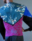 back view, colorful fabric patterning tux style jacket