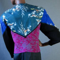 back view, colorful fabric patterning tux style jacket