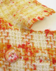 close up detail, sunshine plaid fabric and buttons