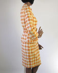 side view, 60s orange plaid skirt suit with belted jacket