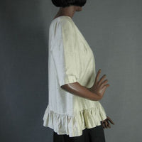 side view, womens vintage blouse ruffled hem 1950s
