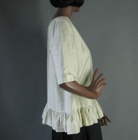 side view, womens vintage blouse ruffled hem 1950s
