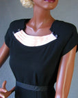 bodice of vintage 40s little black dress pink satin trim