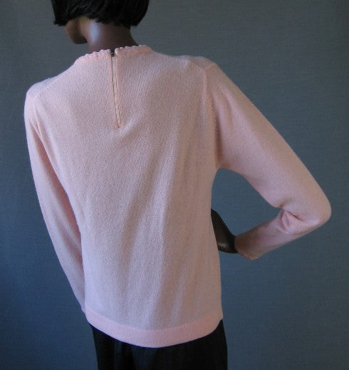 back view, 60s pink pull over sweater with partial back zip