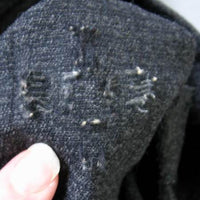 detail closeup inside reweaving repair pants knee