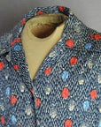 close up detail collar and neckline of men's 1970s arts and crafts disco shirt