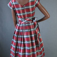 back view, full skirted fit & flare day dress with wiast sash