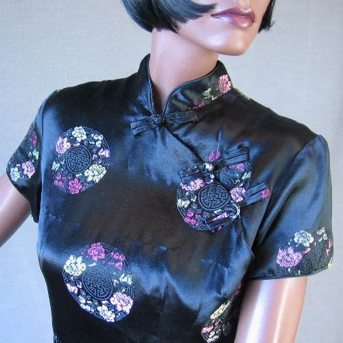 details, pastel floral Asian brocade against black satin Shaheen