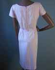 back view of 50s pale pink sheath dress