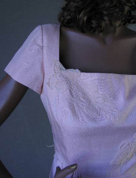 close up view, lace applique at square neckline