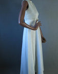 side view, silver and white sparkly 70s maxi dress