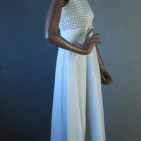 side view, silver and white sparkly 70s maxi dress