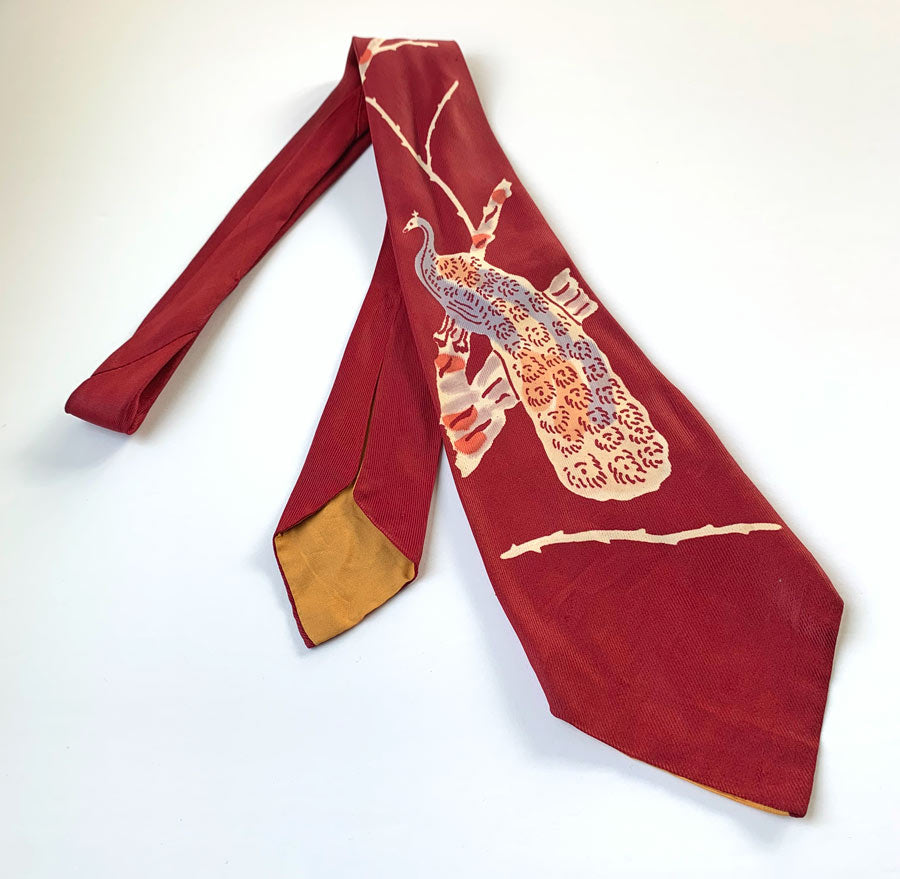 1940s wide maroon necktie with large peacock graphic