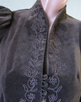 close up details, 70s jacket, corded soutache floral pattern trim and gigot leg of mutton sleeves